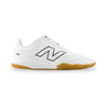 White sneaker with brown sole on a white background