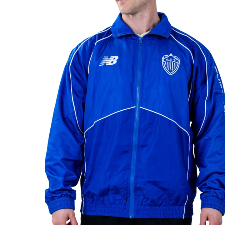 BLUE JACKET WITH WITH NEW BALANCE LOGO AND WHITE AUCKLAND FC LOGO