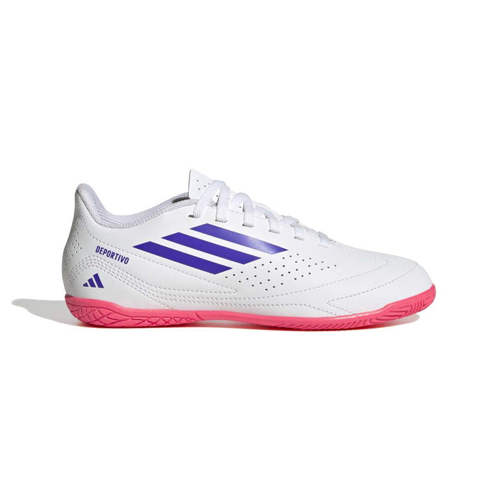 A white Adidas indoor soccer shoe with purple three-stripes and a bright pink outsole, shown in a side profile on a white background.