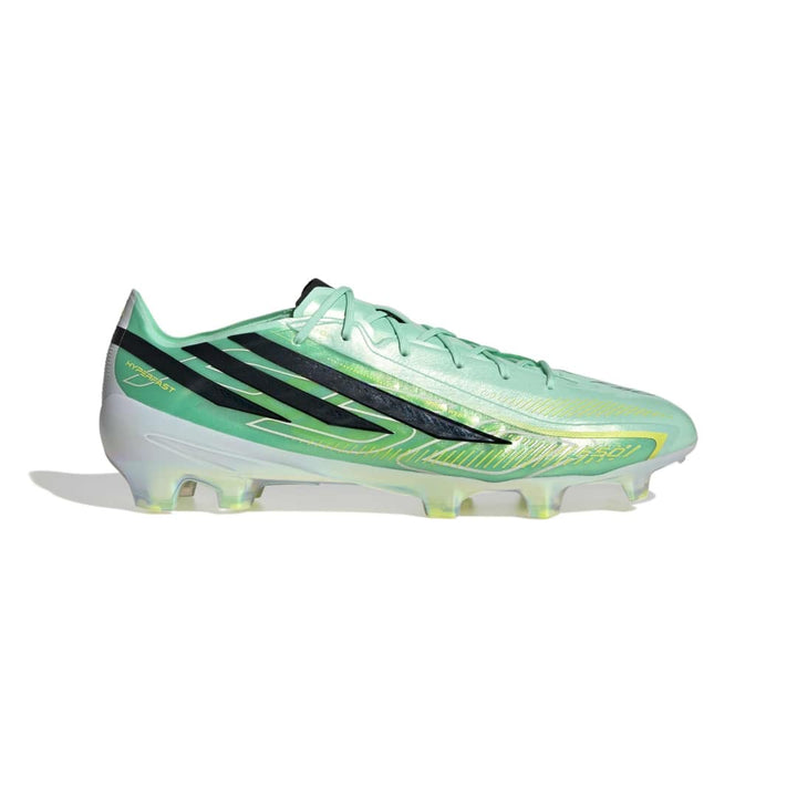 A single Adidas soccer cleat in mint green with black stripes, a white midsole, and neon yellow accents, shown from a side profile on a white background.