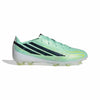 A single Adidas soccer cleat in a light mint green colorway, featuring the signature three stripes in black on the side, a white midsole, and yellow-green accents on the toe and heel, set against a plain white background.