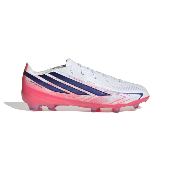 White soccer cleat with pink and blue accents on a white background