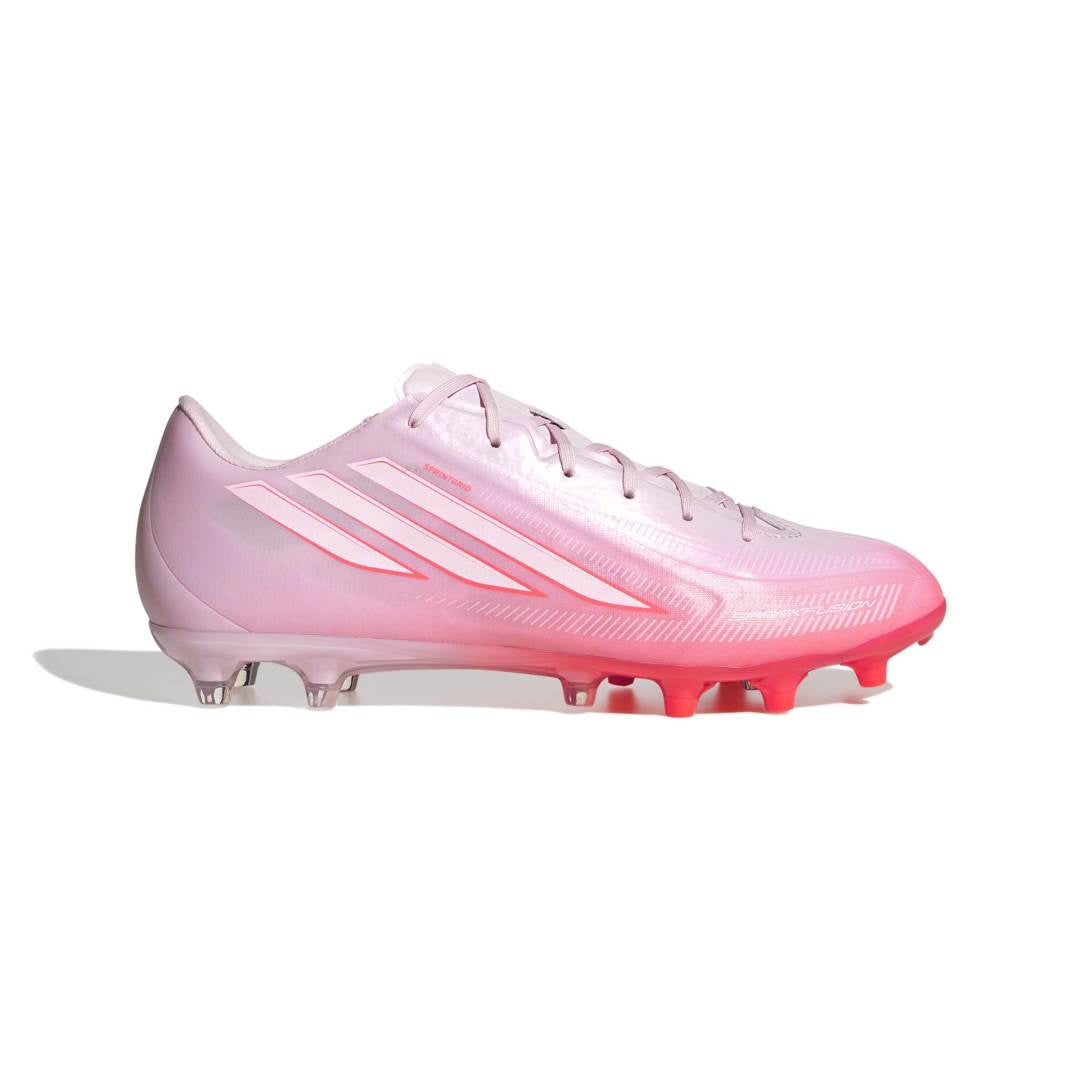 Pink Adidas soccer cleat on a white background