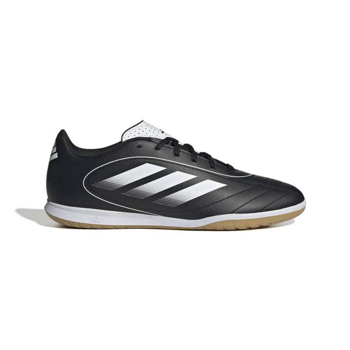 Black Adidas sports shoe with white stripes on a white background