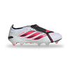 White soccer cleat with pink accents on a white background