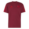 Maroon t-shirt with Adidas logo and shield emblem on a white background
