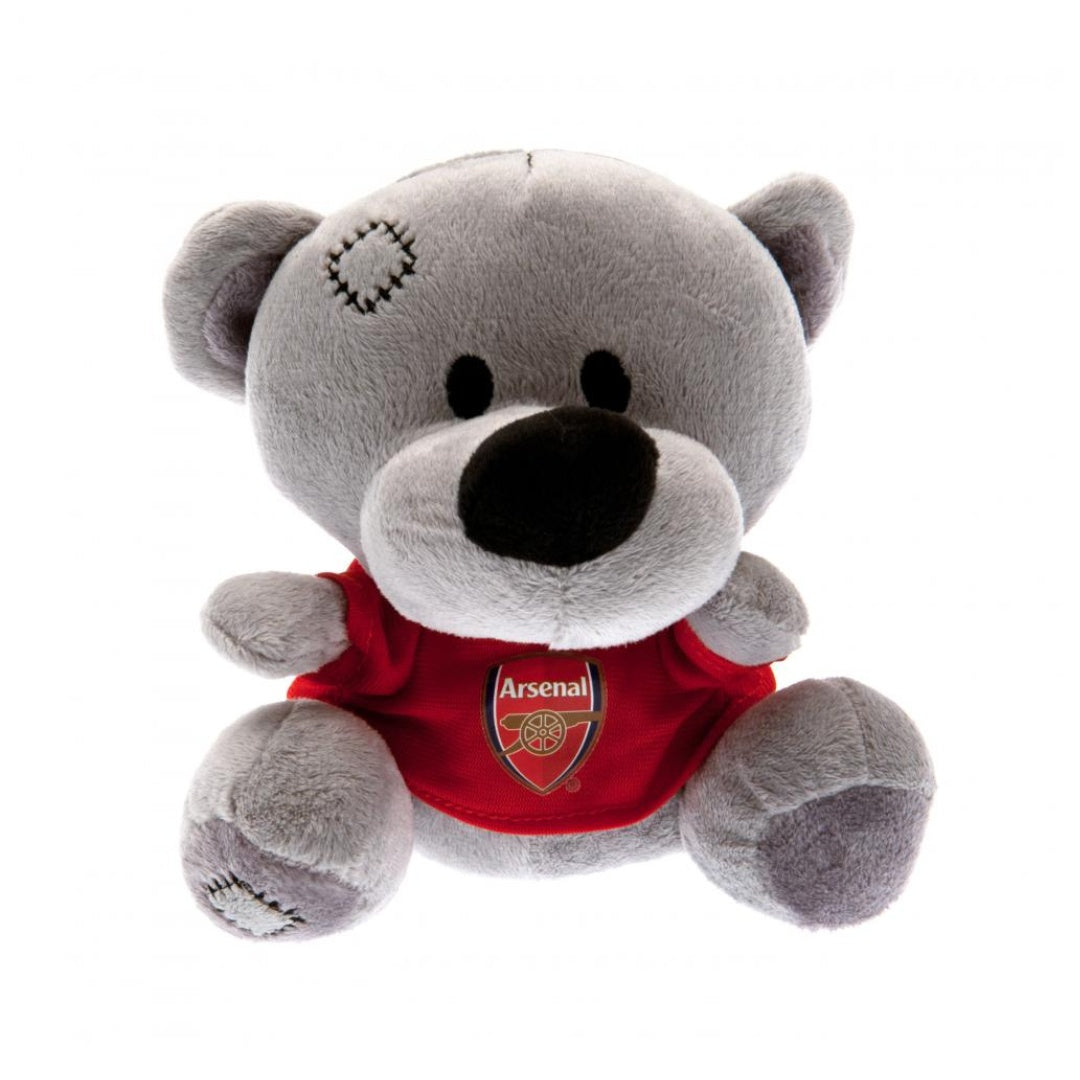 Plush bear toy wearing an Arsenal shirt on a white background