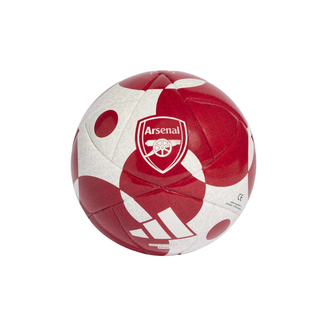 An Adidas Arsenal soccer ball with a red and white pattern, featuring the Arsenal club crest and white Adidas stripes, shown on a plain white background.