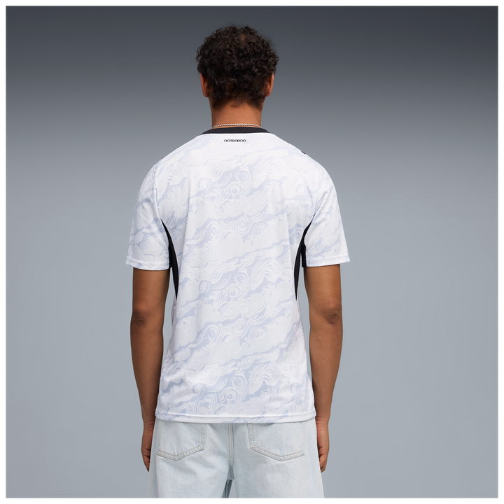back of person wearing NZ All Whites Football Jersey