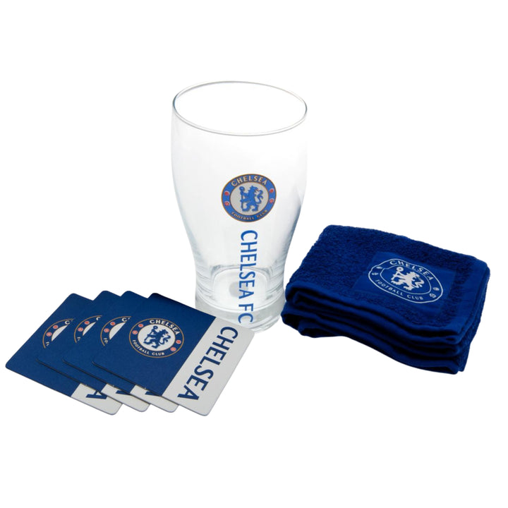 Chelsea FC glass, coaster, and towel set on a white background. The set includes a clear glass with blue Chelsea FC branding, four blue coasters with white borders, and a folded blue towel with a white Chelsea FC crest.
