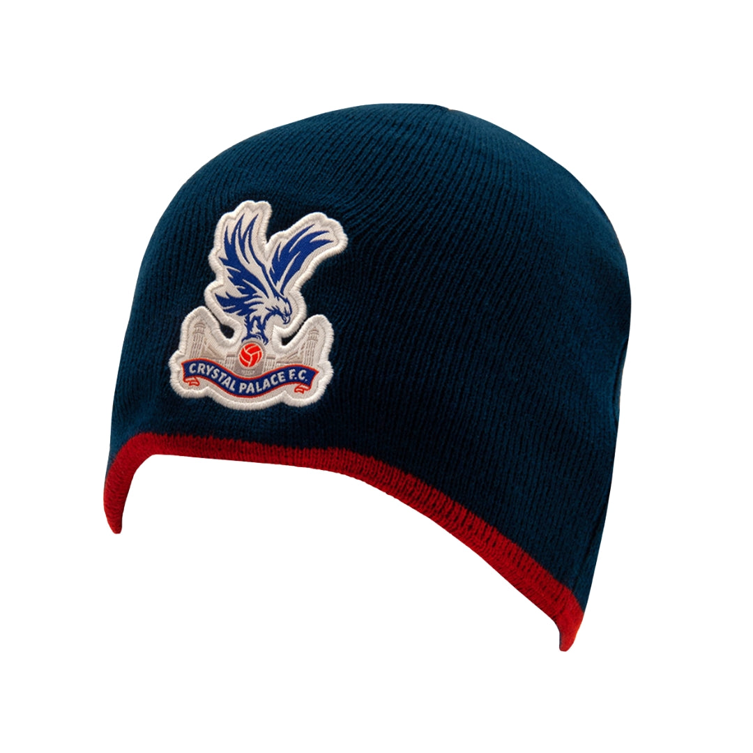 Navy blue beanie with red rim featuring Crystal Palace FC logo on a white background