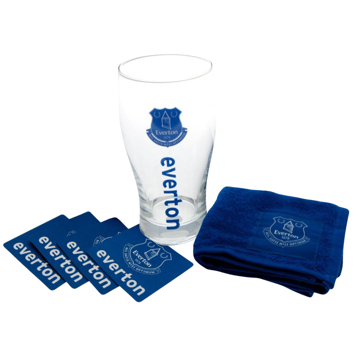 A Everton-themed drinking set on a white background, including a clear pint glass with blue Everton branding, four blue coasters, and a folded dark blue towel with an Everton crest.