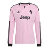 A light pink long-sleeve soccer jersey with black accents, featuring the Jeep logo on the chest, the Adidas trefoil logo, and the Ferrari prancing horse emblem. The jersey has black stripes down the sleeves and black trim at the collar and cuffs.