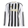 Black and white striped sports jersey with 'Jeep' and Adidas logos on a white background