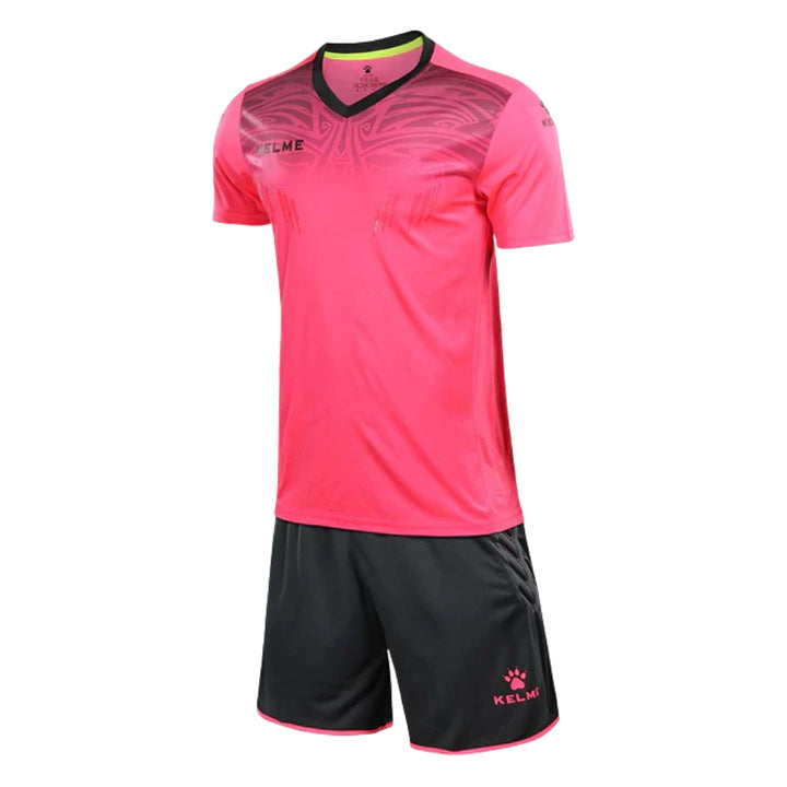 Pink sports jersey and black shorts set with brand logo on a white background