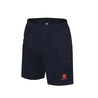 A pair of Kelme Kids Goalkeeper Football Shorts in black with red accents and details.