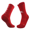 Red socks with a logo on a light gray background