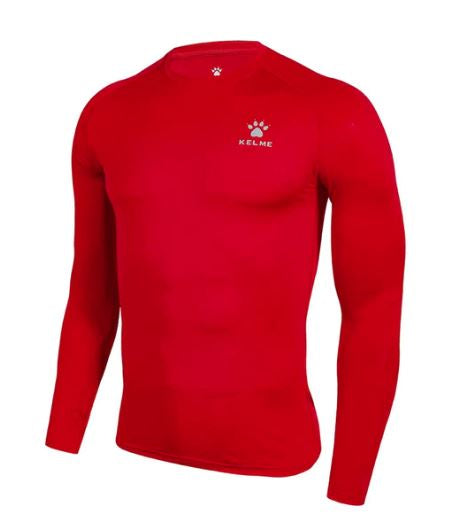 A neon red long sleeve tight base layer for kids with the brand logo 'Kelme' visible on the chest.