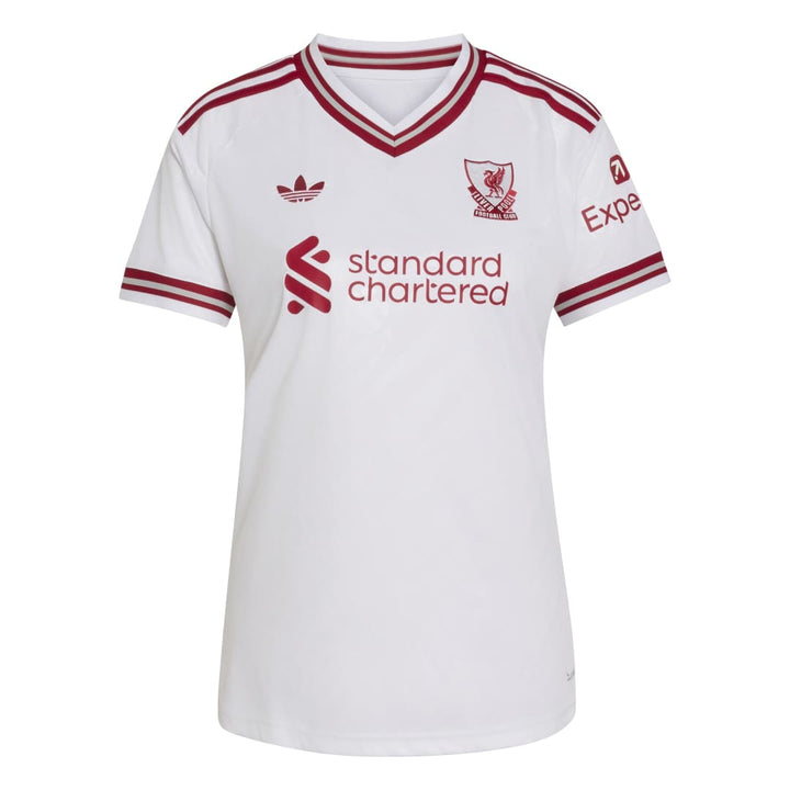 White Adidas Liverpool football jersey with red trim, featuring the Liverpool club crest, standard chartered sponsor logo, and Adidas trefoil logo.