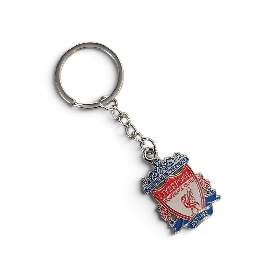 An Inter Miami CF soccer club crest keychain with a silver-tone split ring and chain, featuring red, white, and blue enamel detailing on a white background.
