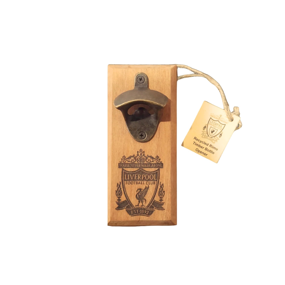 Wooden wall-mounted bottle opener with a tag, featuring a logo and text.