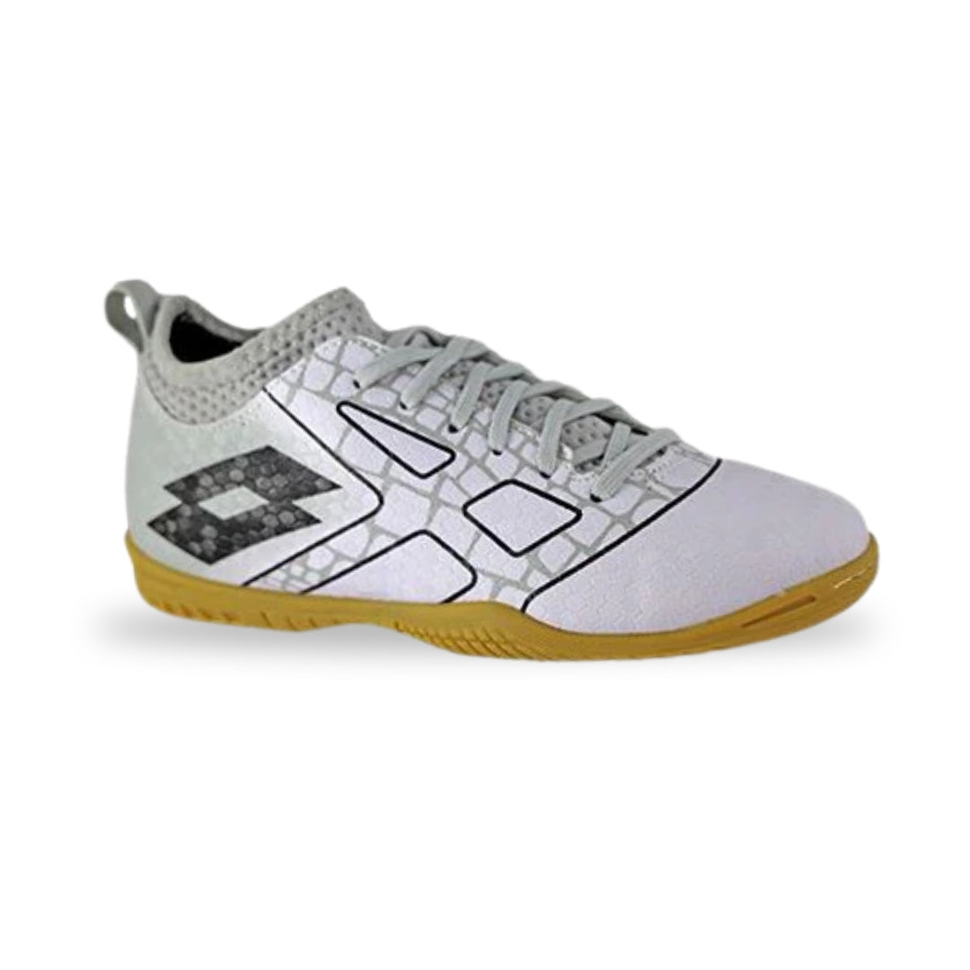 A white indoor soccer shoe with a textured geometric pattern, gray laces, a black and gray logo on the side, and a gum-colored sole, shown against a plain white background.