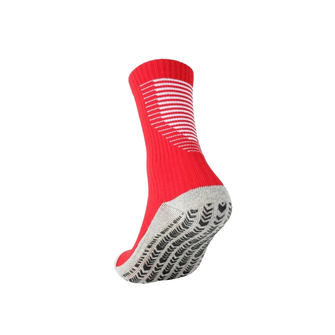 Red sock with a black and white sole on a white background