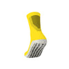 Yellow sock with black pattern on a white background
