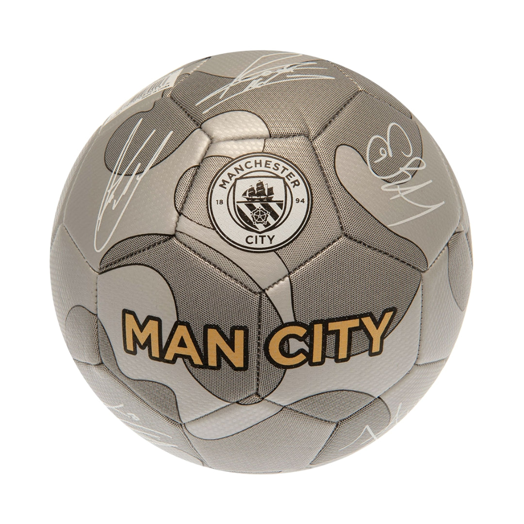 Manchester City soccer ball with signatures on a white background