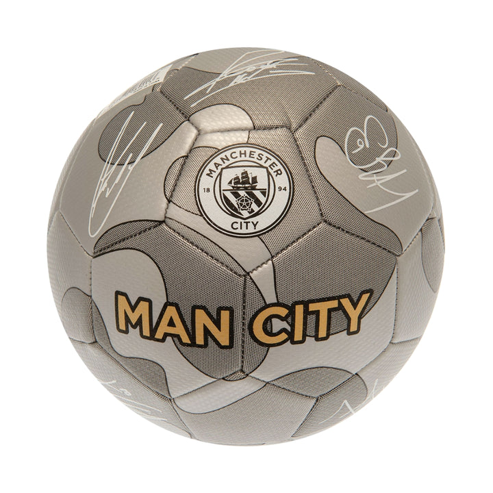 Manchester City soccer ball with signatures on a white background