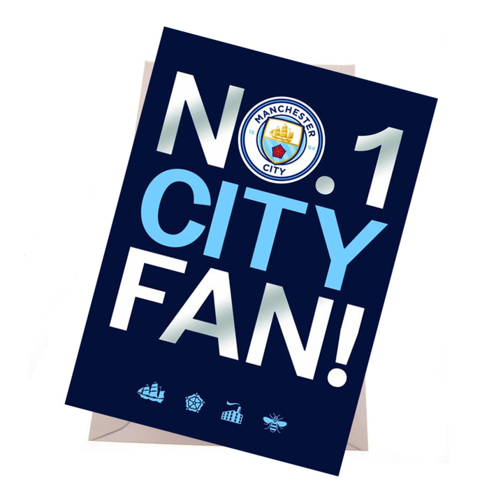 A Manchester City themed greeting card with a navy blue background, featuring the text 'No. 1 City Fan!' in white and light blue, with the Manchester City crest and small club icons at the bottom.