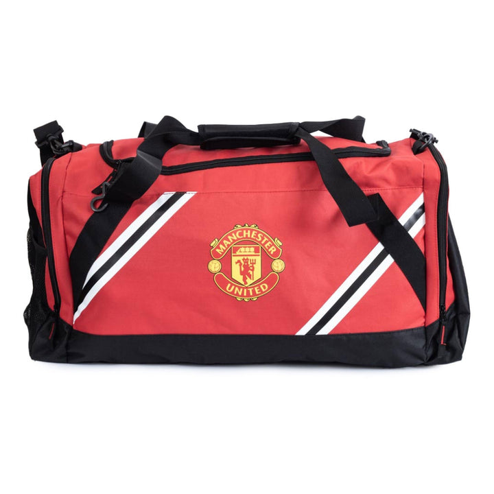 Red duffel bag with Manchester United logo on a white background
