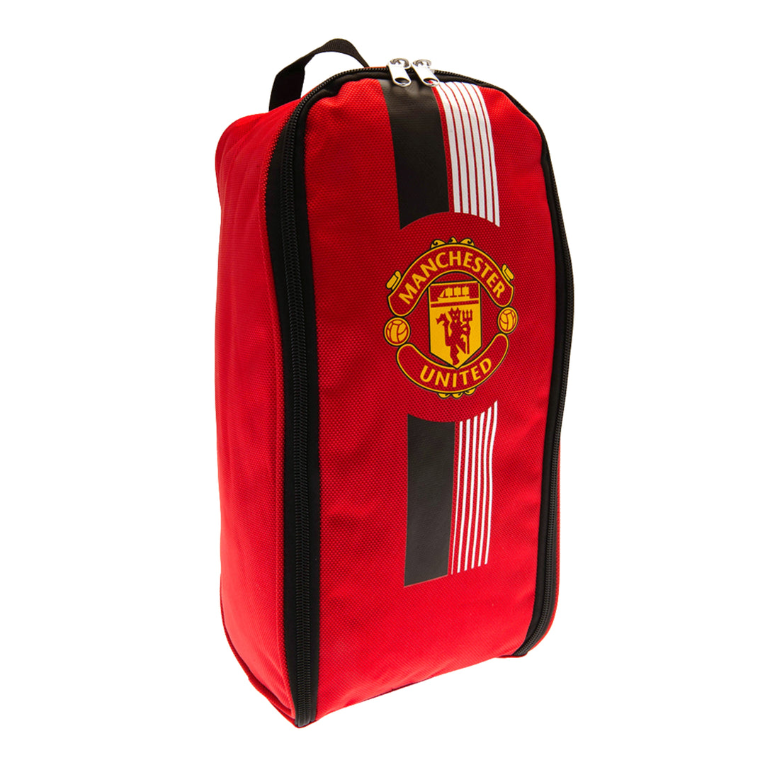 A red Manchester United zippered pouch or bag with black trim, white stripes, and the Manchester United crest on the front, shown on a plain white background.