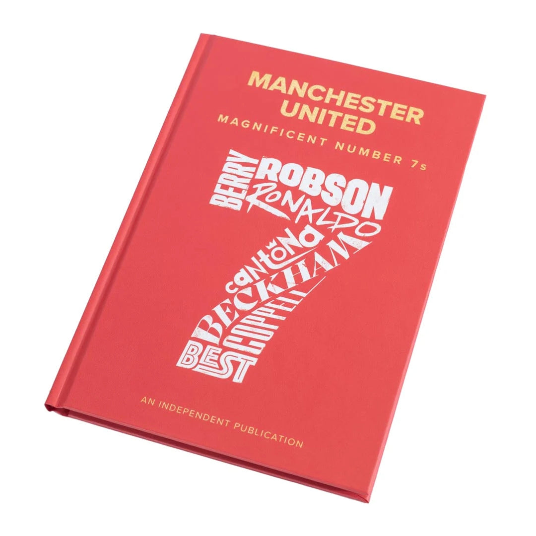 Red book titled 'Manchester United Magnificent Number 7s' with white text on a white background