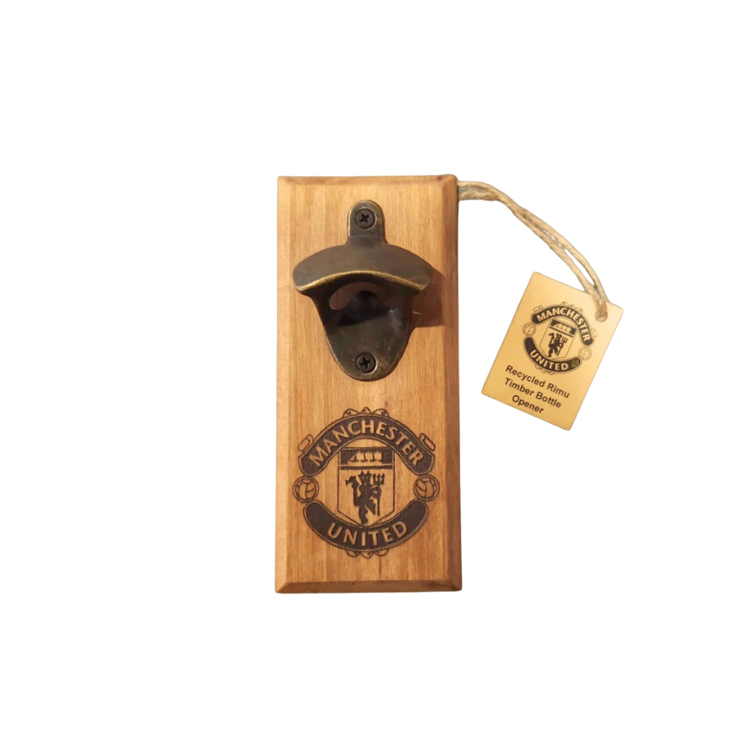 Wooden bottle opener with Manchester United logo on a white background