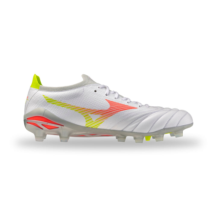 A white soccer cleat with vibrant neon yellow and red accents, featuring a textured synthetic upper and clear molded studs, shown against a plain white background.