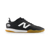 Black sneaker with white logo and brown sole on a white background