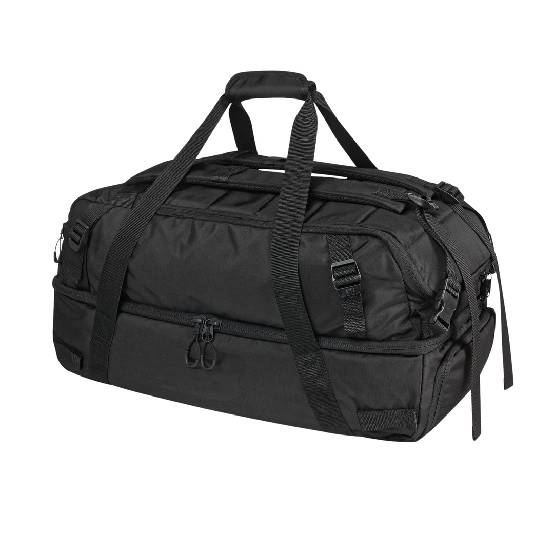A black tactical duffel bag with multiple zippered compartments, webbing straps, and top carry handles, shown on a plain white background.