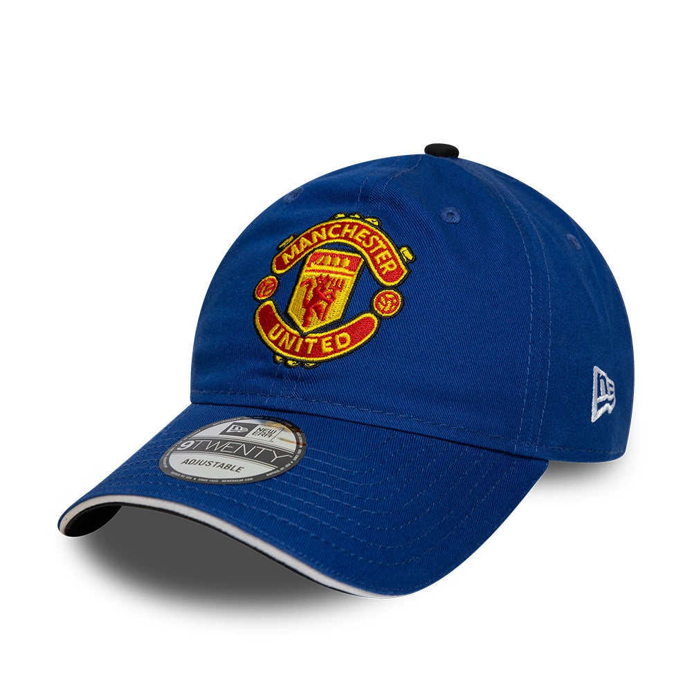 Blue Manchester United cap with logo on a white background
