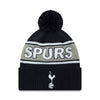 Black beanie with 'SPURS' and a logo on a white background