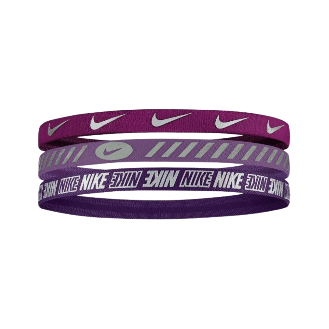 Three purple Nike headbands with white logo and text on a white background