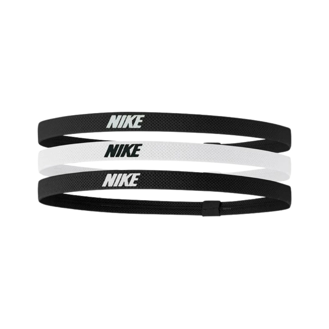 Three Nike headbands in black and white on a white background