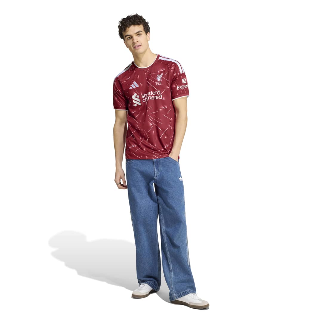 Person wearing mens Liverool FC Home Jersey and jeans