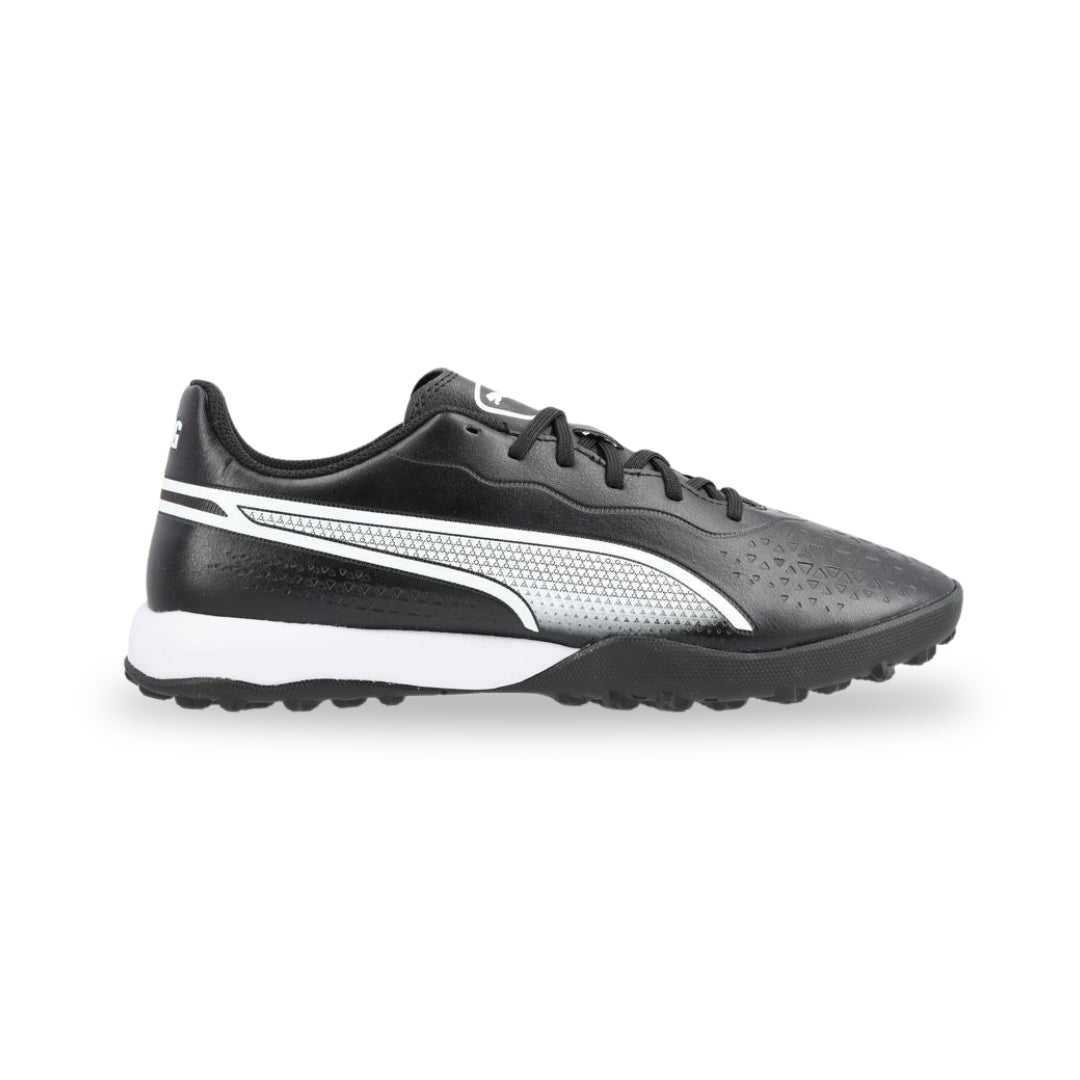 Black Adidas running shoe with white stripes on a white background