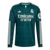 A dark green Real Madrid long-sleeve soccer jersey with white accents, featuring the Adidas logo, Real Madrid crest, Emirates Fly Better sponsor text, and HP branding on the sleeve.