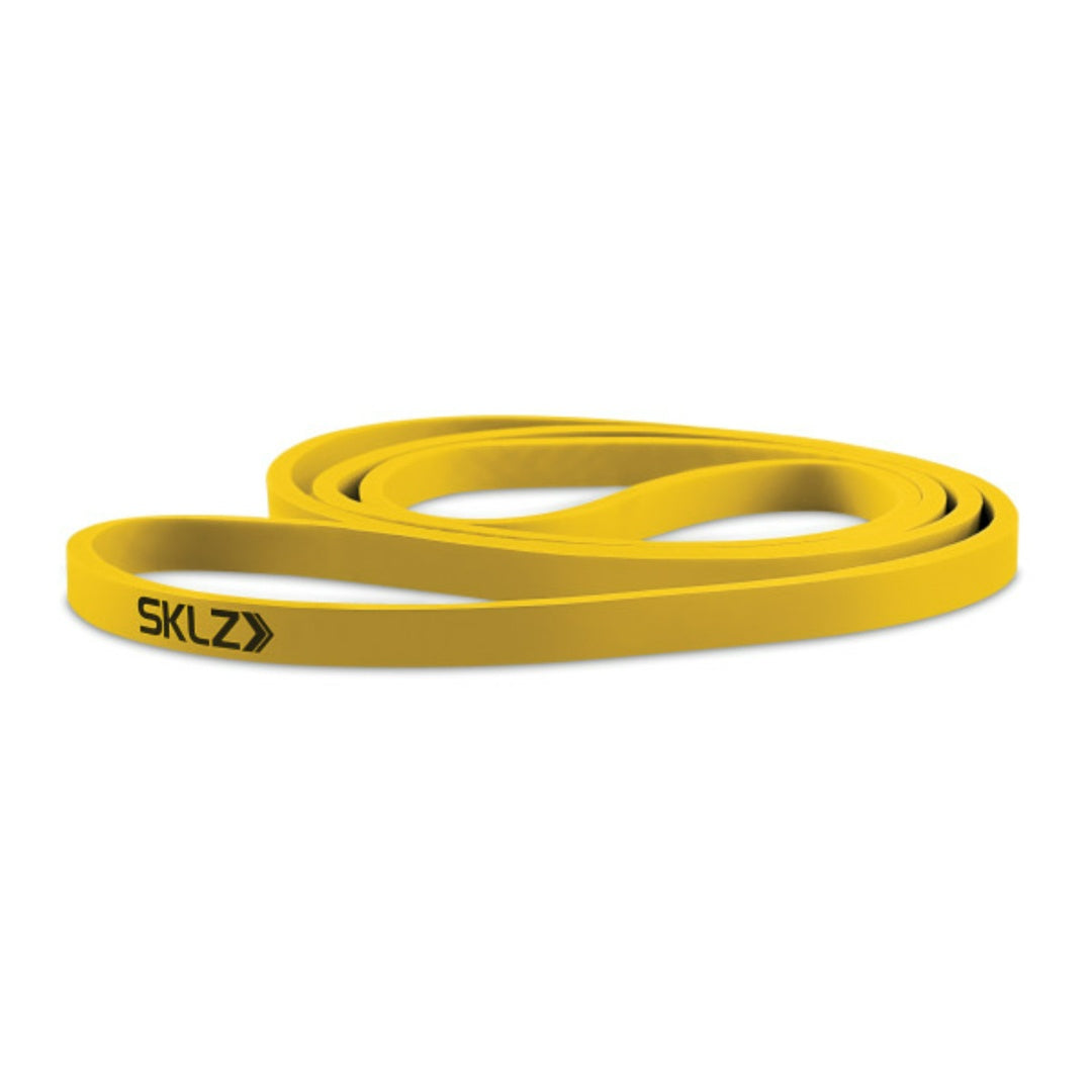 Yellow resistance band with SKLZ logo on a white background