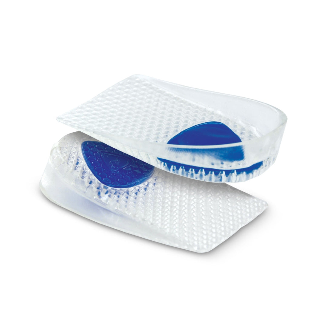 White shoe inserts with blue gel pads on a white background