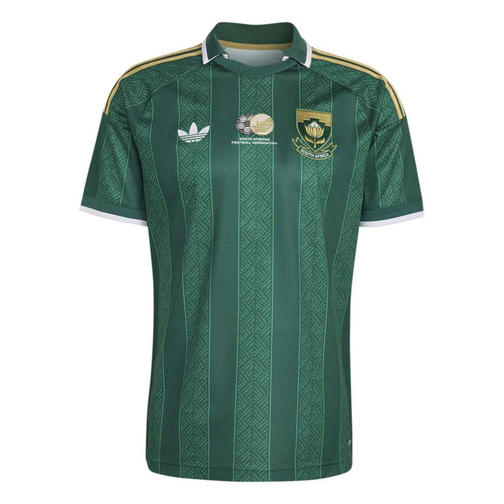 Green sports jersey with Adidas logo on a white background