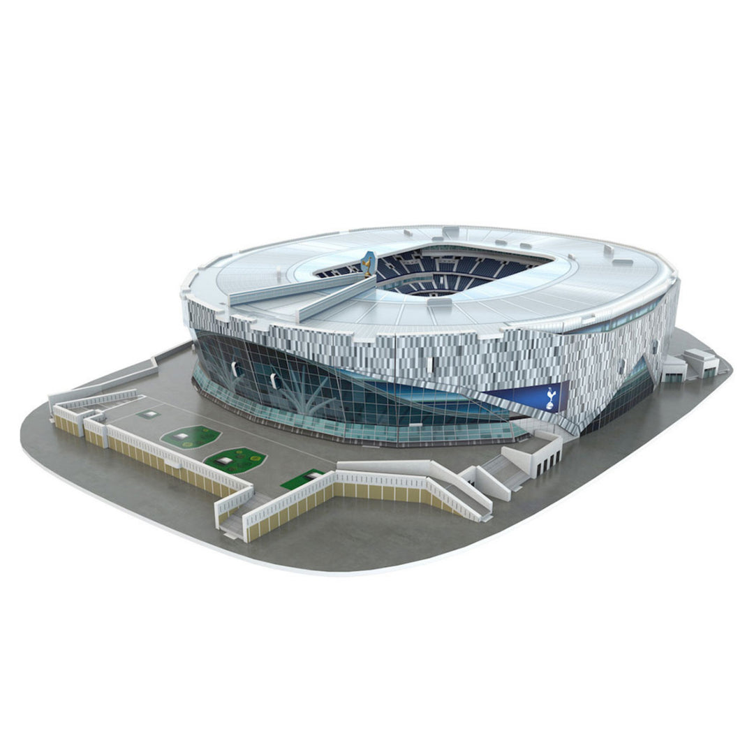 A 3D model or miniature scale model of the London Stadium, featuring its distinctive white and blue patterned exterior, glass facade, and surrounding access roads on a clean white background.